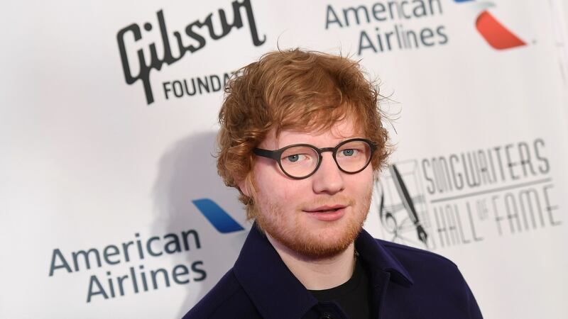 Ed Sheeran receives an MBE for services to music and charity. Photograph:  angela Weiss/AFP/Getty Images