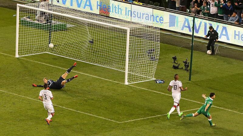 Shane Long scores Ireland’s famous winner at home against world champions Germany. Photograph: Morgan Treacy/Inpho