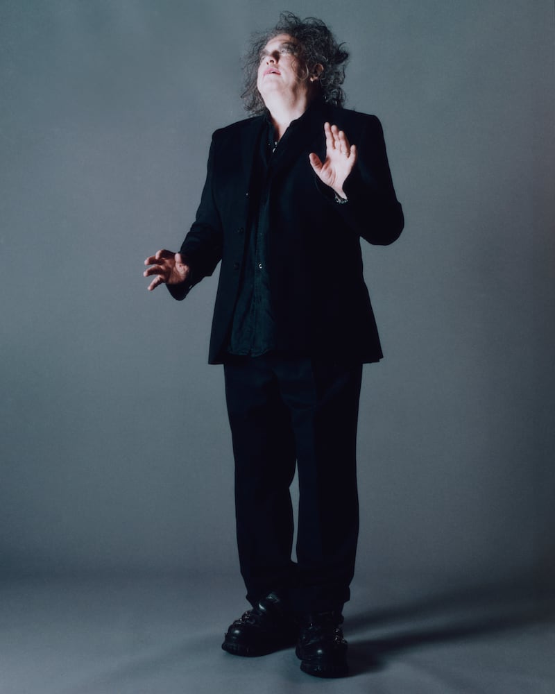 Robert Smith, frontman of the Cure, whose first new album in 16 years is out this week, in Brighton, England on Oct. 30, 2024. 'I think it's natural, as you grow older, to feel more and more despairing of what goes on,' Smith said of the material on their new album. 'Because you've seen it all before and you see the same mistakes being made. And I feel like we're going backwards.' Photograph: Charlie Gates/The New York Times