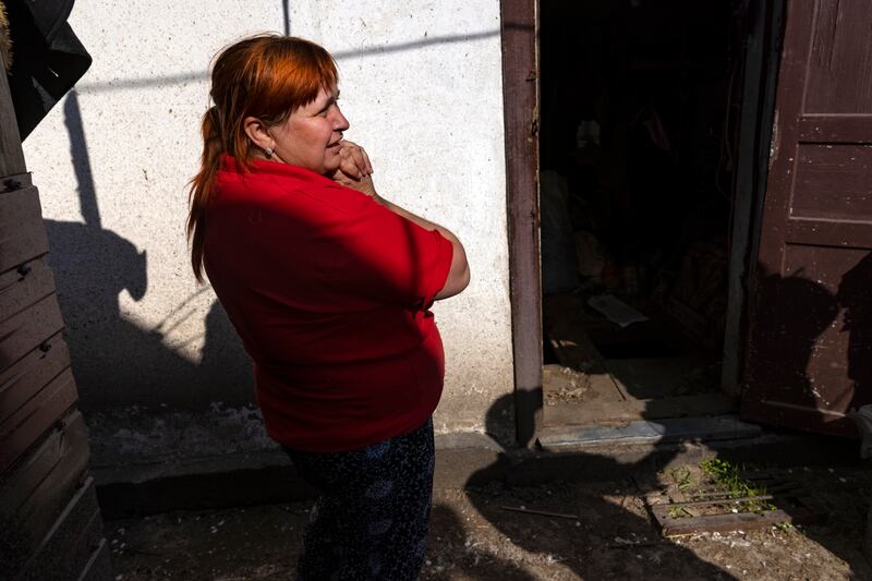 Svitlana Voyteshenko on May 14th, the day her family returned to view the wreckage of their home, destroyed in the crash of a Russian warplane, in Chernihiv, Ukraine. Photograph: David Guttenfelder/The New York Times