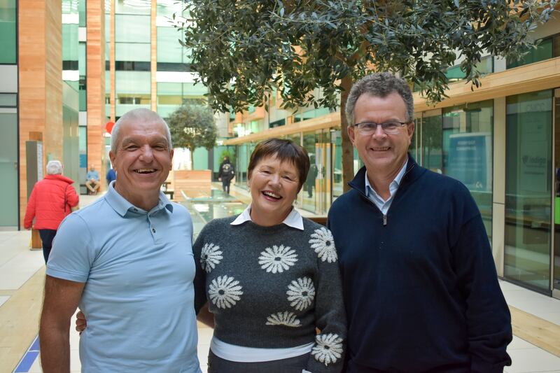 Ann, with her husband (left), and Prof Robert Kelly.