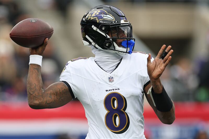 EAST RUTHERFORD, NEW JERSEY - DECEMBER 15: Lamar Jackson #8 of the Baltimore Ravens throws a pass during the first half against the New York Giants at MetLife Stadium on December 15, 2024 in East Rutherford, New Jersey. (Photo by Sarah Stier/Getty Images)