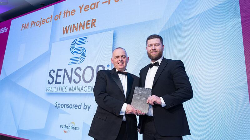 Des Mahon, director at Authenticate, presents the FM Project of the Year - Public Sector award to Shane Cranny, Sensori Facilities Management.