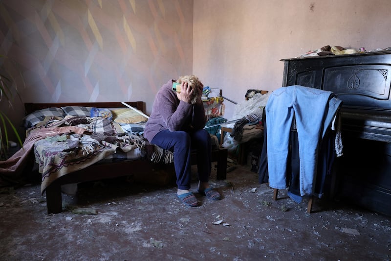 Local resident Oksana (54) reacts to damage caused by a missile attack, in the bedroom of her house, in the village of Krasylivka, Kyiv region, Ukraine, on May 8th. Photograph: Anatolii Stepanov/AFP/Getty