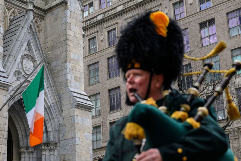 A participant plays the bagpipes during the St Patrick's Day parade in New York City. Photograph: Angela Weiss/AFP via Getty Images