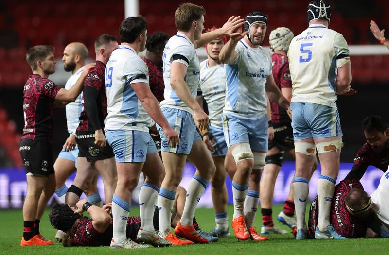 Jordie Barrett, centre, celebrates a turnover with Caelan Doris against Bristol Bears. Photograph: James Crombie/Inpho