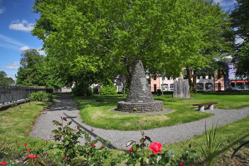 Fair Green, Kenmare, where fairs and markets were held frequently. The triangular green was enclosed in the last century and remains the property of the Derreen Estate, formely the Lansdowne Estate. Photograph: Valerie O'Sullivan