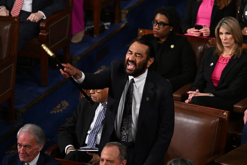 Al Green shouts as US president Donald Trump delivers an address to a joint session of Congress. Photograph: Kenny Holston/New York Times
                      