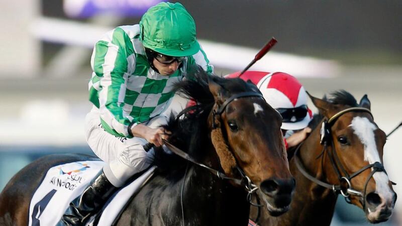 Ryan Moore, riding Lines of Battle, races towards the finish line during the fourth race "UAE Derby" of the Dubai World Cup at the Meydan Racecourse. Photograph: Ahmed Jadallah/Reuters