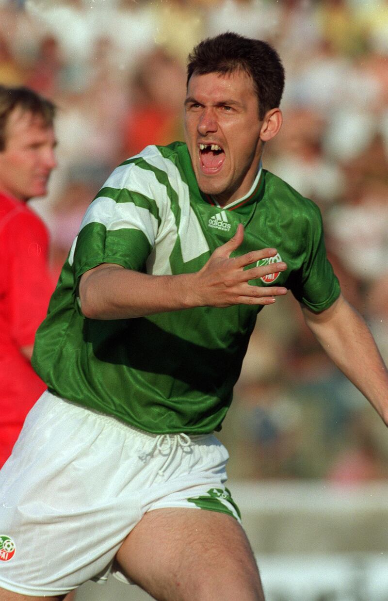 Tony Cascarino celebrates scoring the late winner in the away victory over Albania in 1993. Photograph: Billy Stickland/Inpho 
