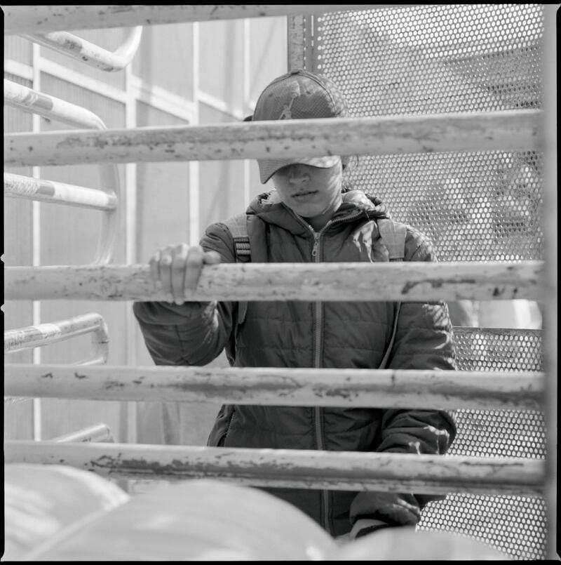 A woman porter at the Barrio Chino border.