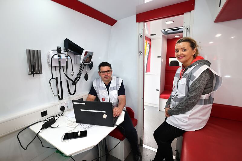 Dr David Healy and Sarah Jayne Miggin, nurse, in the Mobile Health Unit (MHU) Safetynet. Photograph: Dara Mac Dónaill 







