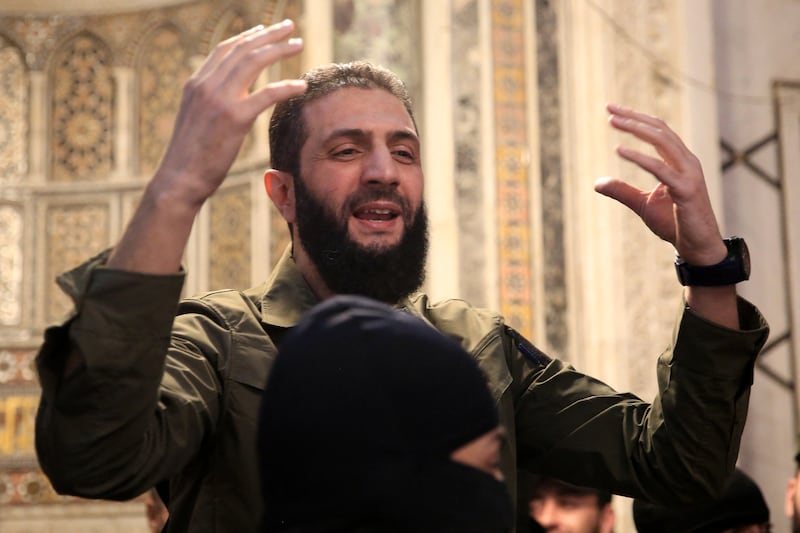 The leader of Syria's Islamist Hayat Tahrir al-Sham (HTS) group, Abu Mohammed al-Jolani, address a crowd at the capital's landmark Umayyad Mosque. Photograph: Aref Tammawi/AFP/Getty Images