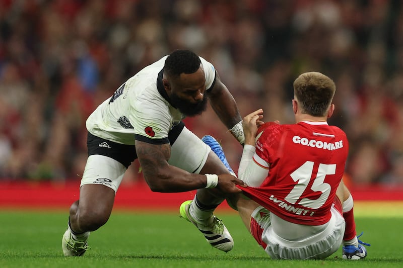 Fiji's wing Semi Radradra received a yellow card for this tackle on Wales' fullback Cameron Winnett at the Principality Stadium in Cardiff. Photograph: Adrian Dennis/AFP/Getty Images 