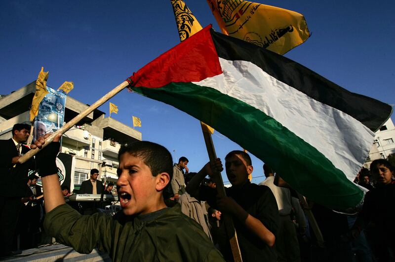 A Palestinian boy participates in a pro-election rally organised by the Fatah movement in  2005 in the Beit Lahyea Refugee Camp in the  Gaza Strip. Photograph: Abid Katib/Getty Images