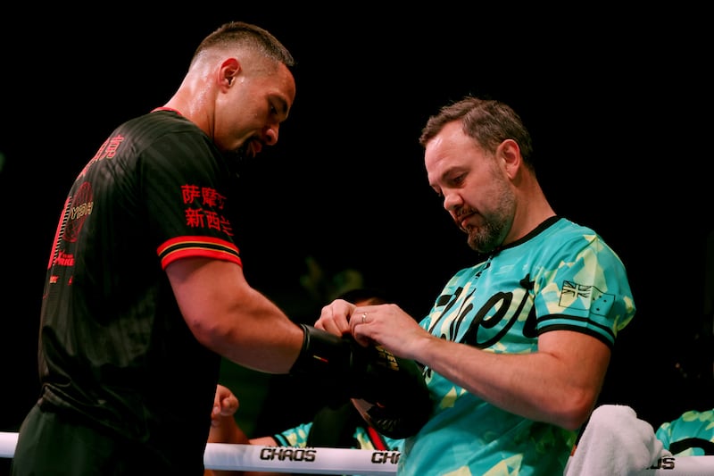 Trainer Andy Lee ties Joseph Parker's gloves for a media workout before Parker's WBO Interim World Heavyweight Title fight against Zhilei Zhang in Riyadh last year. Photograph: Richard Pelham/Getty