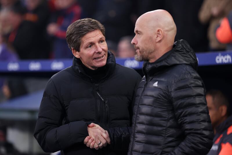 Oliver Glasner, manager of Crystal Palace, shakes hands with Erik ten Hag. Photograph: Alex Pantling/Getty