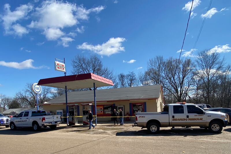 Law enforcement personnel work at the scene of a shooting in Arkabutla. Photograph: Adam Itayem/NewsNation via AP