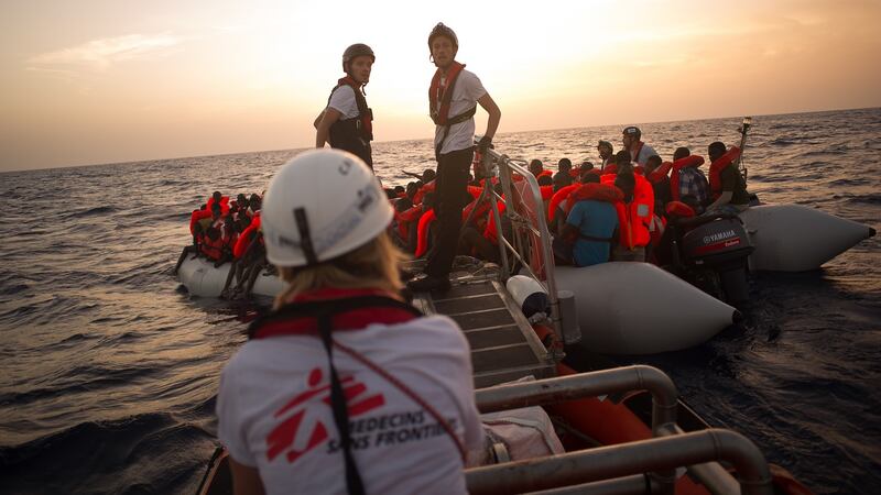 Rescue teams from Médecins Sans Frontières and Sos Mediterranee during a rescue operation in the Mediterranean sea. Some 180 people were rescued from this rubber boat and transferred to the MV Aquarius vessel. Photograph: Guillaume Binet/MYOP