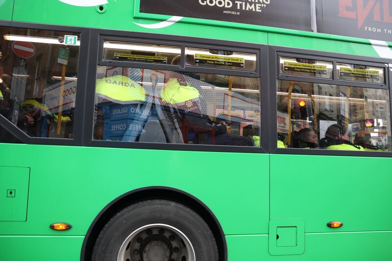 A bus carrying gardaí in Dublin city on Tuesday as preparations conditions for the US president's visit. Photograph Nick Bradshaw