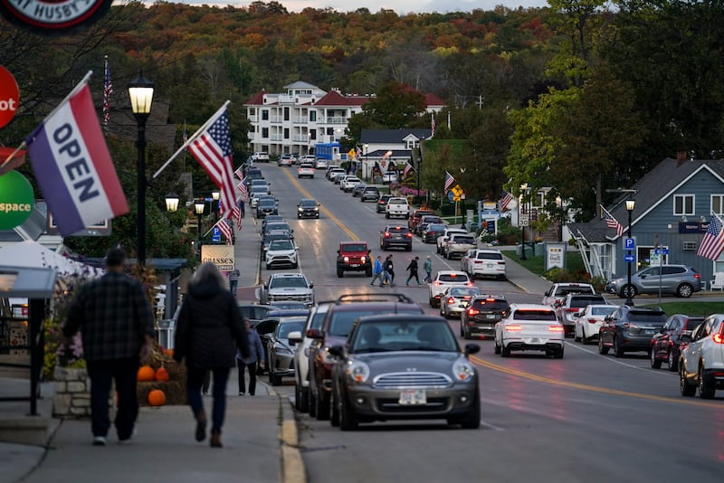 People walk through Sister Bay in Door County, Wisconsin. Photograph: Carolyn Van Houten/The Washington Post via Getty Images