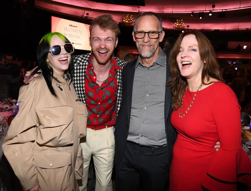 Billie Eilish with her brother, Finneas O’Connell, father, Patrick O’Connell, and mother, Maggie Baird. Photograph: Kevin Mazur/Getty