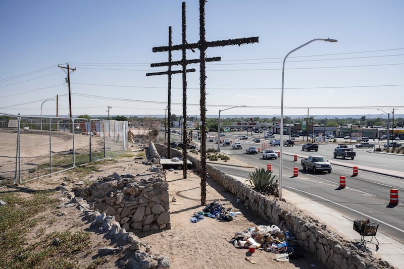 A homeless camp beneath the three crosses that give Las Cruces, New Mexico, its name. Photograph: Justin Hamel/The New York Times
                      