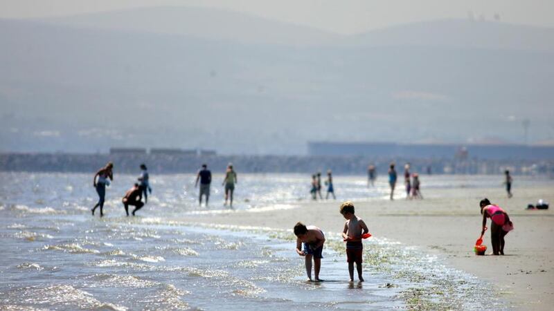 Making the most of the weather on Dollymount Strand. Photograph: Bryan O’Brien