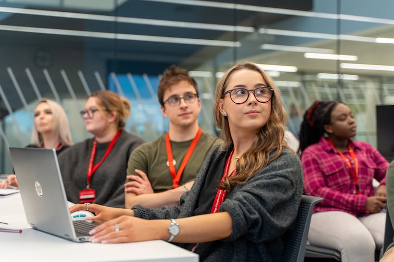 Kayleigh Perkins and class members mid lecture at RCSI