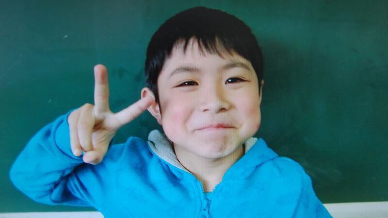 An undate handout picture provided by an elementary school shows Yamato Tanooka. The seven-year-old boy was missing for six days after he was abandoned in a bear-inhabited forest in northern Japan as a punishment. Photograph: AFP Yamato Tanooka (7) found unharmed six days after being left on the road as a punishment