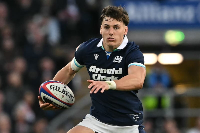 Scotland's centre Tom Jordan makes a break during the Six Nations international rugby union match between England and Scotland at the Allianz Stadium in Twickenham, south-west London on February 22, 2025. (Photo by Glyn KIRK / AFP) (Photo by GLYN KIRK/AFP via Getty Images)          