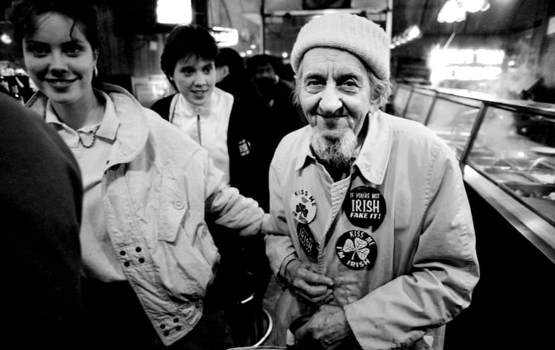 If you're not Irish, fake it and other badgees on display on Fifth Avenue, Manhattan in 1995