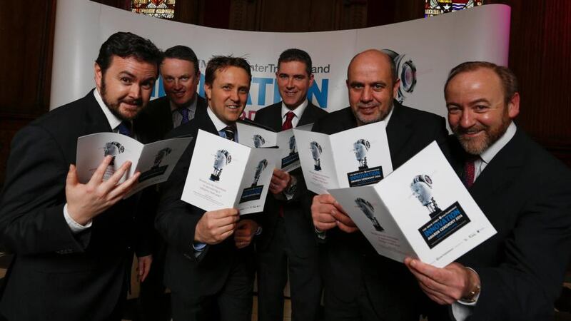 Michael McAleer of The Irish Times (left) and InterTradeIreland chief executive Thomas Hunter McGowan (right) with Oxymem, the overall winners of The Irish Times InterTradeIreland Innovation Awards held at the RHK in Dublin. Oxymem are (from left) John Geaney, Wayne Byrne, Eoin Casey and Nigel Coombes. Photograph: Brenda Fitzsimons