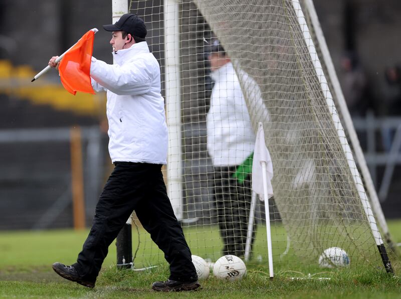 An umpire signals a 2-point score during the Westmeath v Louth clash at Cusack Park, Mullingar. Photograph: James Crombie/Inpho