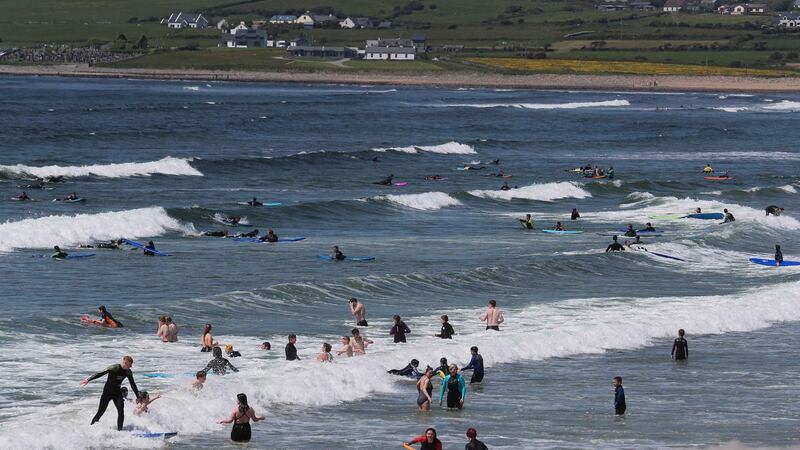 Beachgoers in the water at Lahinch, Co Clare. Photograph: Eamon Ward