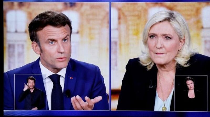 Images from the recent televised debate between French president Emmanuel Macron and far-right party Rassemblement National candidate Marine Le Pen. Photograph: Ludovic Marin/AFP via Getty