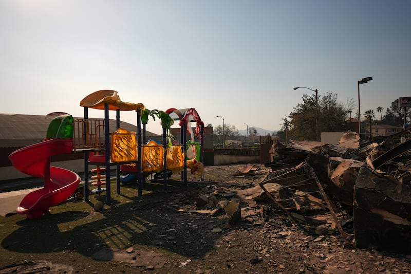 The disaster has destroyed entire homes with flames hitting churches, schools, a synagogue, libraries, bars and playgrounds. Photograph: Jae C Hong/AP