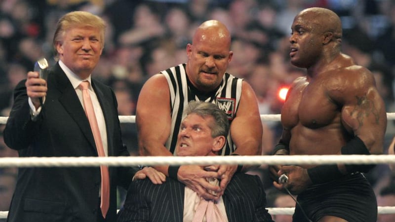 WWE chairman Vince McMahon prepares to have his head shaved by Donald Trump and Bobby Lashley while being held down by ‘’Stone Cold’’ Steve Austin after losing a bet in the Battle of the Billionaires at the 2007 WWE’s Wrestlemania at Ford Field in Detroit, Michigan. Photograph: Bill Pugliano/Getty