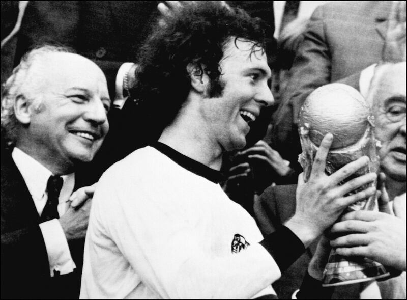 West Germany's captain Franz Beckenbauer receiving the World Cup after a 2-1 victory over Holland on July 7th, 1974, at Munich's Olympic Stadium. Photograph: STF/AFP via Getty Images