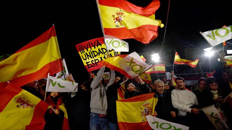 Supporters of Spanish far-right Vox party celebrate  outside the party’s headquarters  in Madrid on Sunday. Photograph:  Oscar Del Pozo/AFP via Getty Images