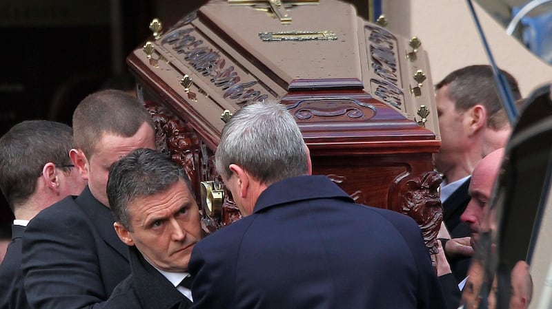 Dessie O’Hare (front left of the coffin) carrying the remains of gangland figure Eamon Kelly, who was shot dead near his home in Killester, Dublin, in 2012. Photograph:  Colin Keegan, Collins, Dublin