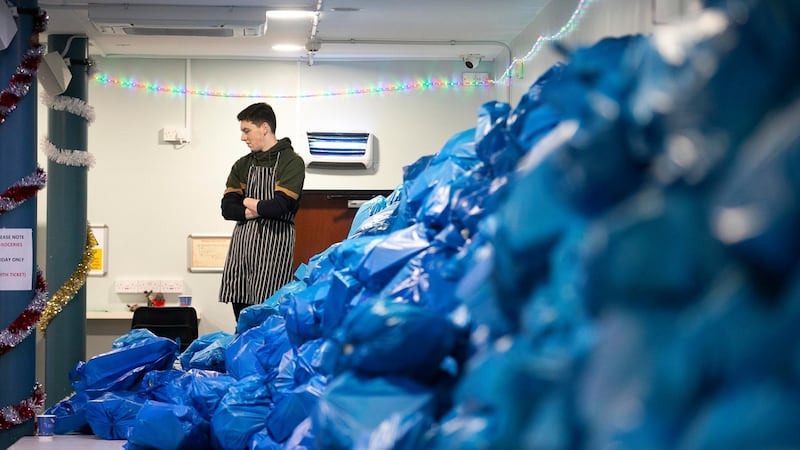 Piled high: The parcels contain butter, ham, cooked turkey portions, cooked chicken, rashers, sausages, black pudding, milk, tea, sugar, biscuits. Photograph: Sam Boal/Rollingnews.ie