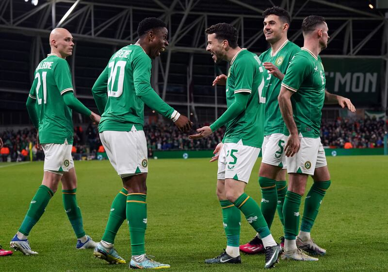 Republic of Ireland's Chiedozie Ogbene celebrates scoring the team's third goal with Mikey Johnston during the friendly against Latvia at the Aviva Stadium. Photograph: PA