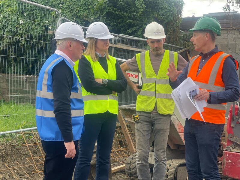 David Mooney and Ann Brannigan discussing the build with Dermot Bannon