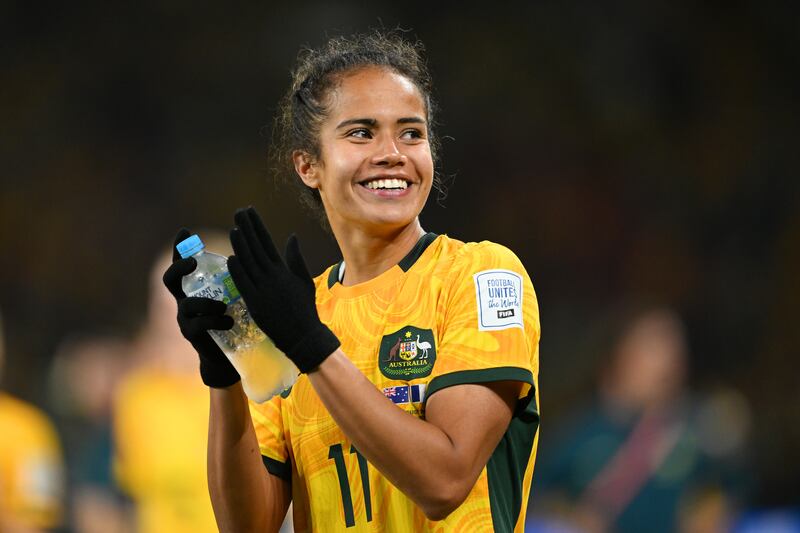 Mary Fowler of Australia applauds fans after her team’s victory over Sweden on penalties. Fowler’s father is from Ireland, and her mother is from Papua New Guinea; she represents the multicultural nation that Australia aspires to be. Photograph: Quinn Rooney/Getty Images 