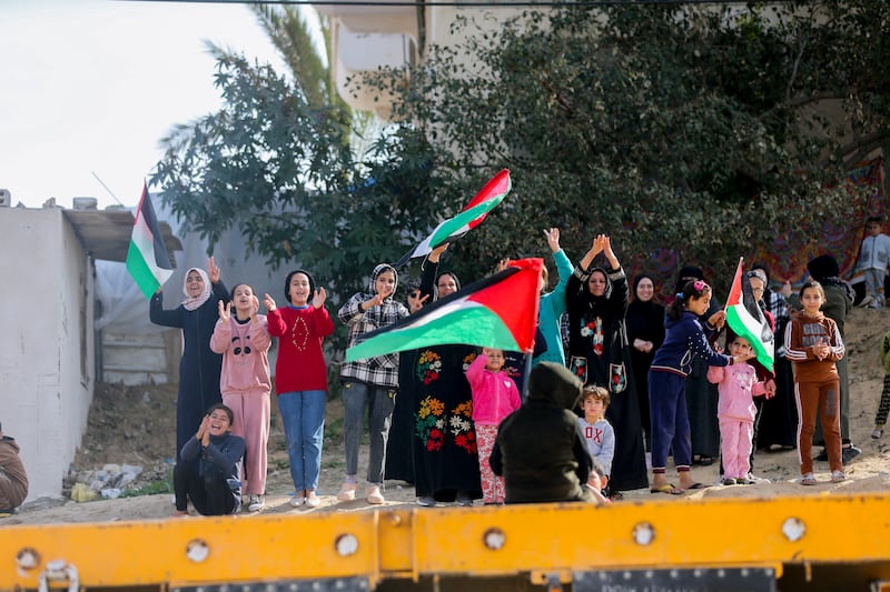 Palestinians celebrate in Rafah, Gaza Strip, on Sunday, following the ceasefire agreement between Israel and Hamas. Photograph: Youssef Alzanoun/Middle East Images via AFP