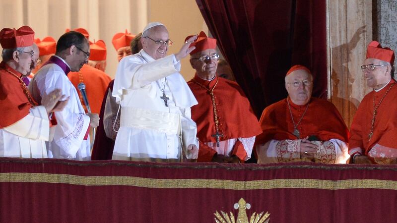 Argentina’s cardinal Jorge Bergoglio  appears with cardinals at the window of St Peter’s Basilica after being elected the 266th pope of the Roman Catholic Church on March 13th, 2013. Photograph: Filippo Monteforte/AFP/Getty Images