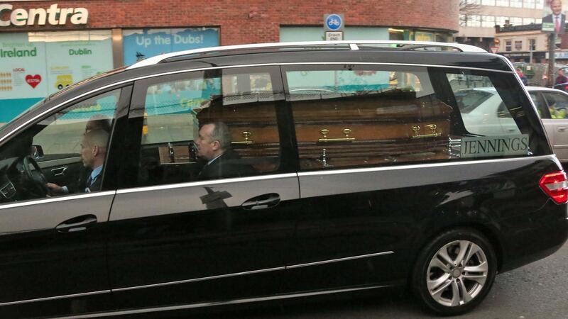 The remains of Eddie Hutch, who was shot dead in his home in Dublin last week, are brought to his sister’s home on Portland Row on Wednesday evening under a heavy Garda presence. Photograph: Colin Keegan/Collins.