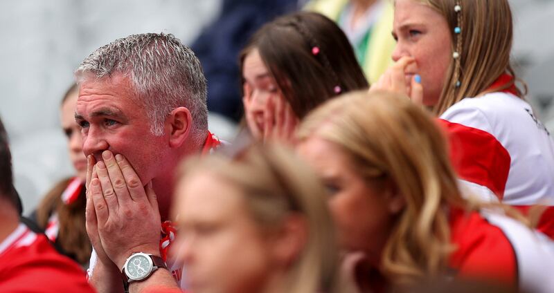 Derry fans look on during their defeat to Kerry in the All-Ireland SFC quarter-final. Photograph: Ryan Byrne/Inpho