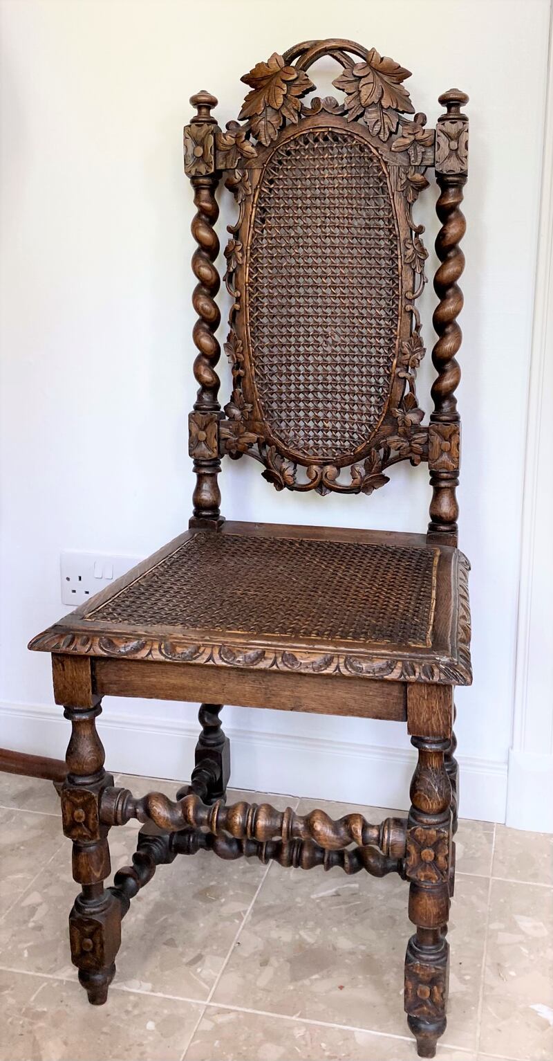 Antique oak carved Jacobean chair with woven panels from Hegarty's of Bandon